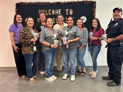  Employees holding gifts